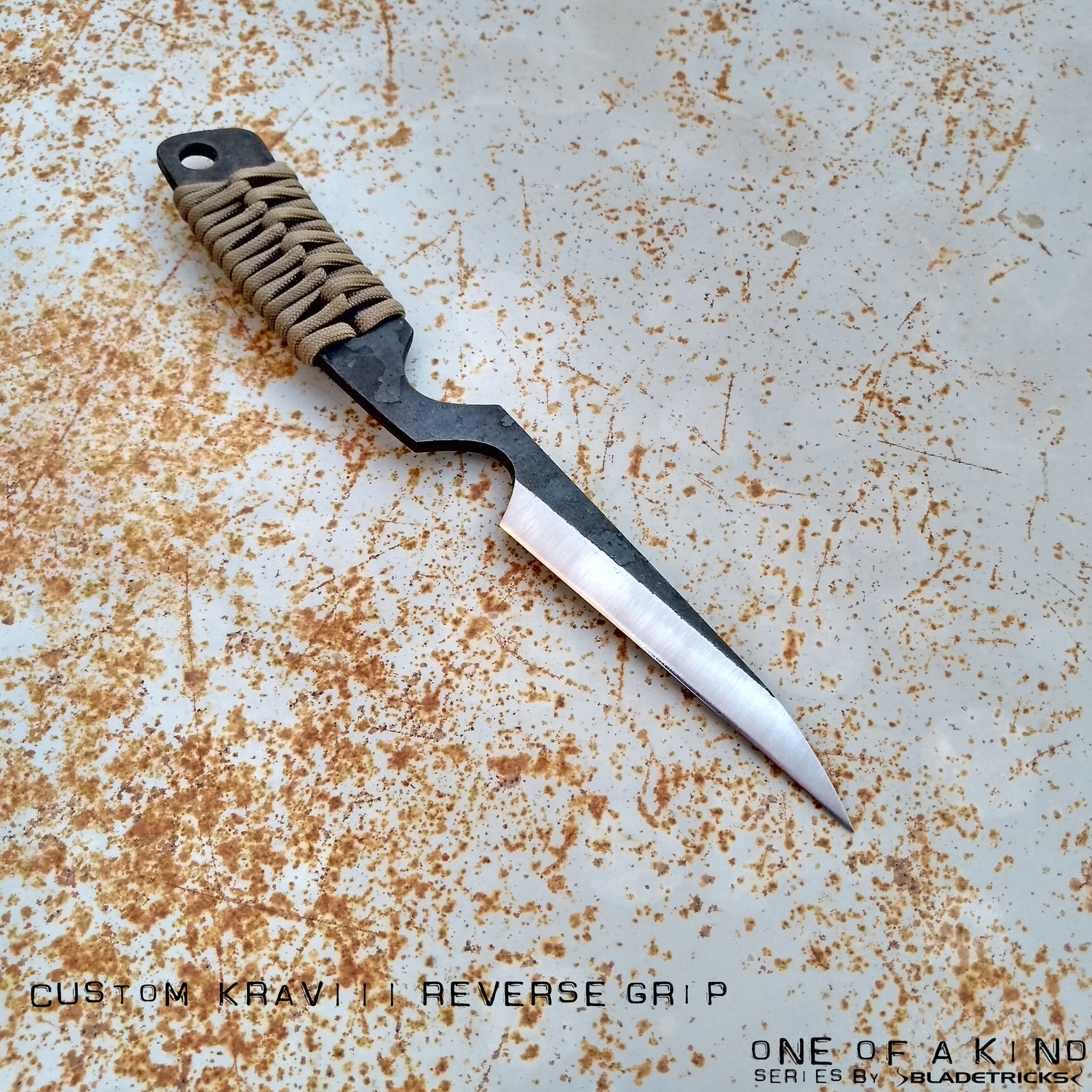 Pikal reverse grip knife paracord wrap
