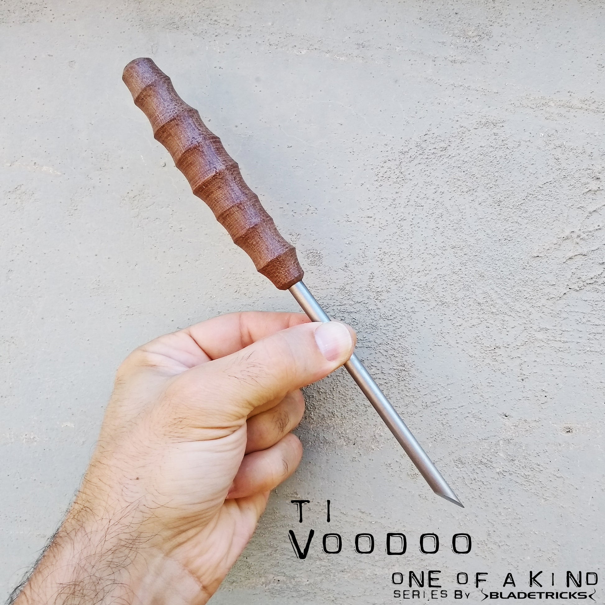 Hand sculpted custom titanium ice pick by Bladetricks hand made knives